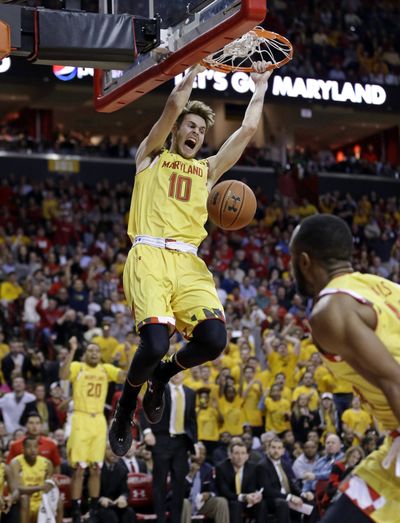 Maryland’s Jake Layman dunks during win over Wisconsin. (Associated Press)