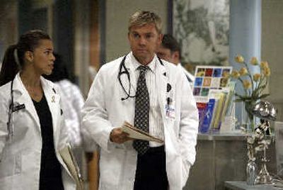 
Actor Rick Schroder as Dr. Dylan West smiles on the set of 