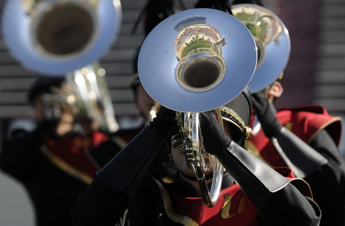 Members of the brass section of the University High School band perform intricate maneuvers during  Saturday’s competition at Joe Albi Staduim. (Jesse Tinsley / The Spokesman-Review)