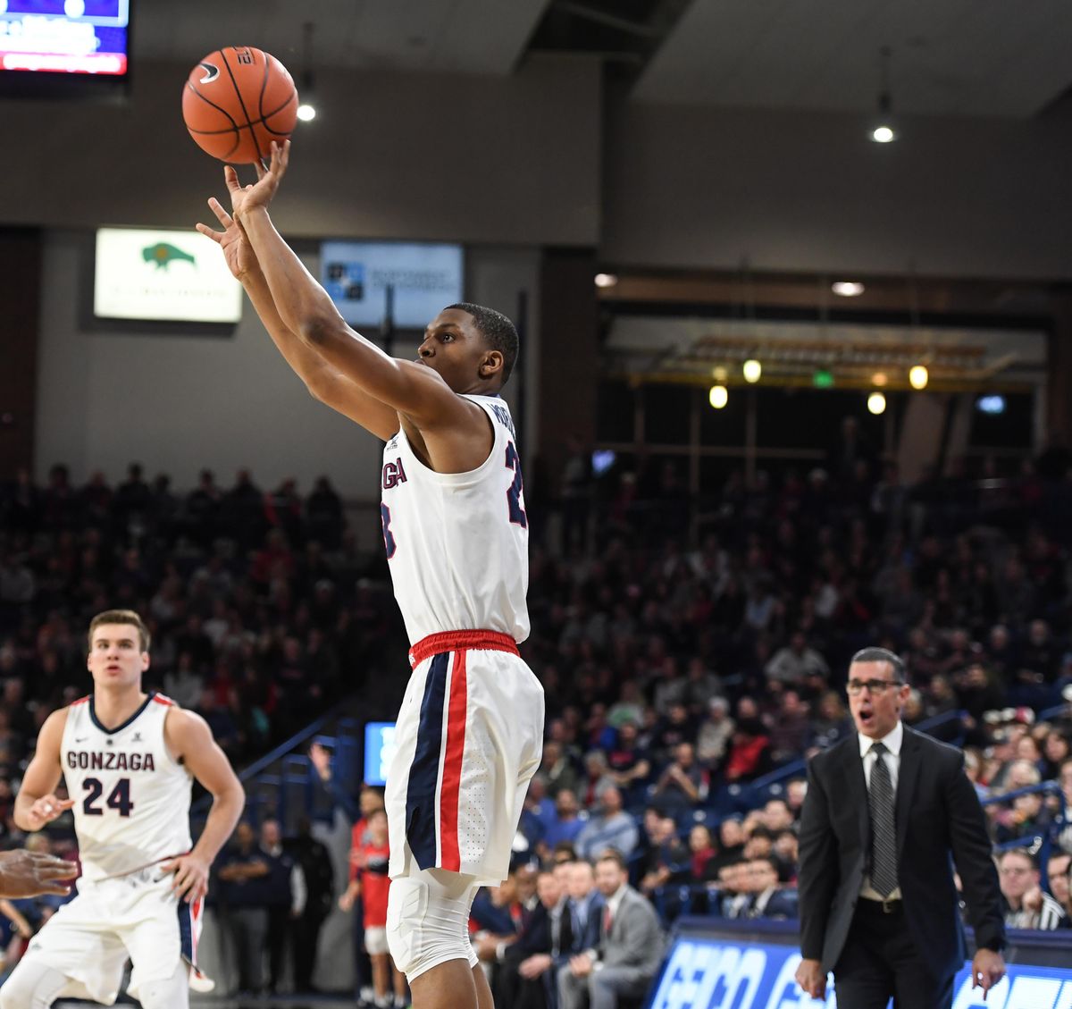 Gonzaga guard Zach Norvell Jr. hits a shot in front of North Alabama coach Tony Pujol, Friday, Dec. 28, 2018 in the McCarthey Athletic Center. (Dan Pelle / The Spokesman-Review)