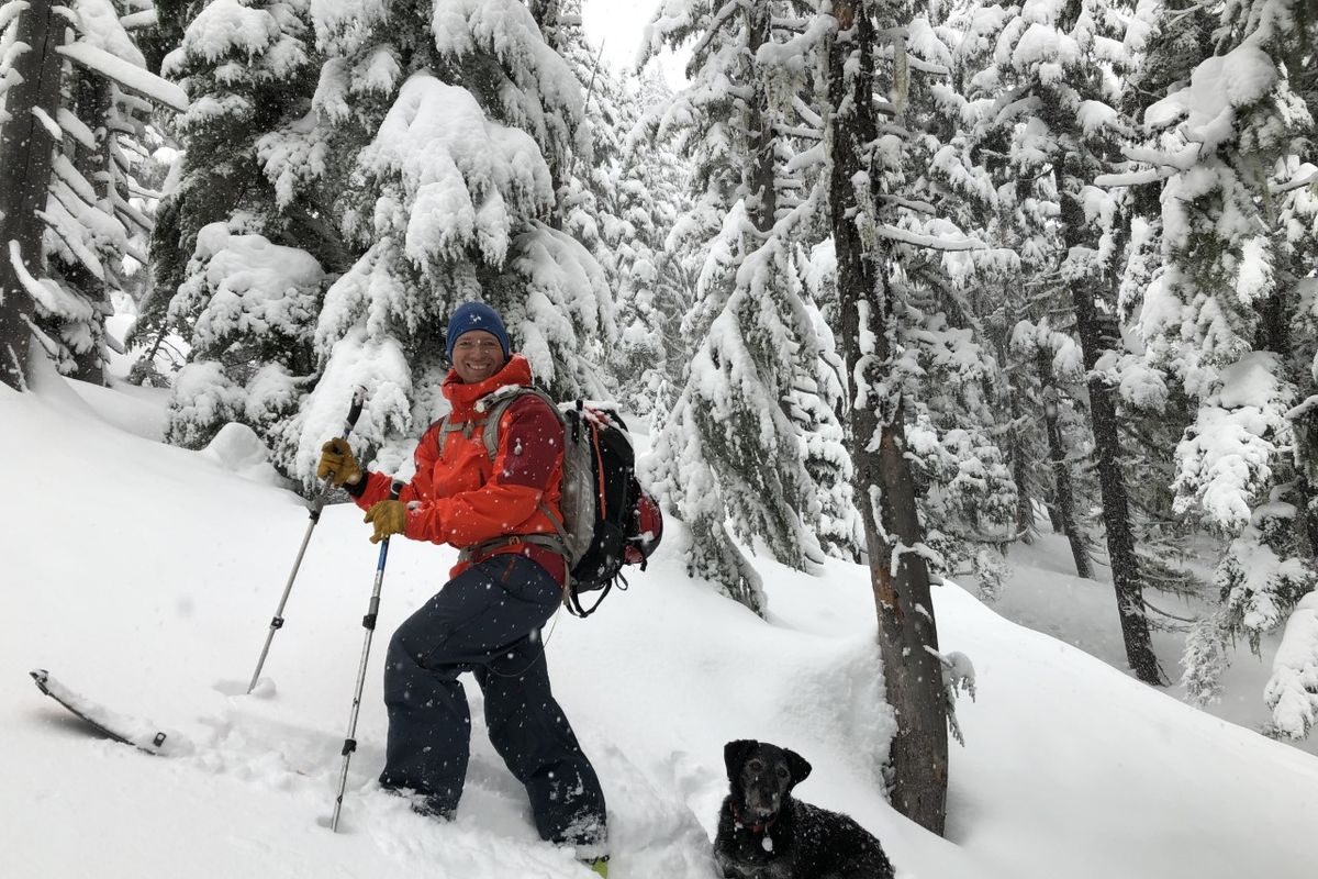 Jason Keen and his dog Kona advancing uphill.  (Courtesy of Heather Keen)