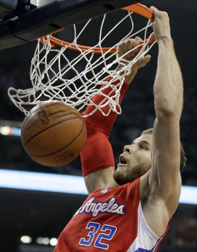 Blake Griffin of the Los Angeles Clippers will miss the Olympics with torn cartilage in his left knee. (Associated Press)