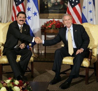 
President Bush meets with Honduran President Manuel Zelaya during bilateral meetings Monday in New York. 
 (Associated Press / The Spokesman-Review)