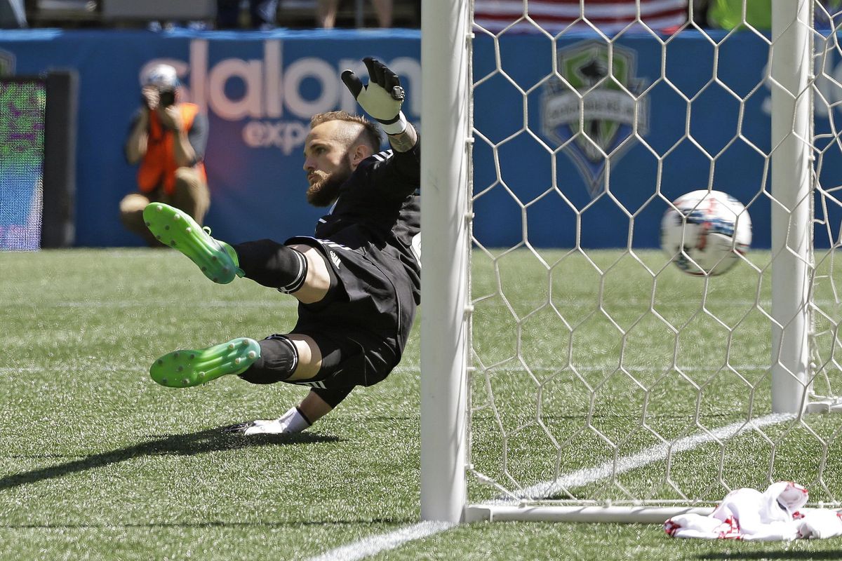 Seattle Sounders goalkeeper Stefan Frei can’t stop a penalty kick goal scored by Toronto FC forward Jozy Altidore in the first half of an MLS soccer match, Saturday, May 6, 2017, in Seattle. (Ted S. Warren / Associated Press)