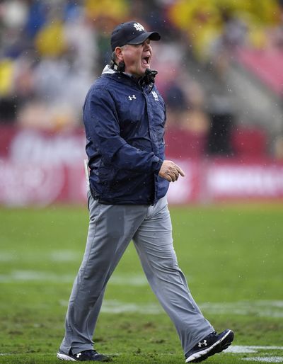 Notre Dame head coach Brian Kelly yells to his team during the first half of Saturday’s loss at USC. (Mark J. Terrill / Associated Press)