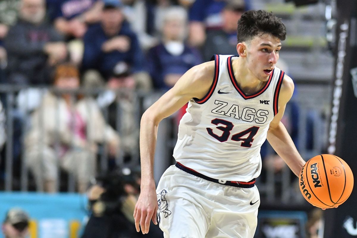 Gonzaga Bulldogs center Chet Holmgren (34) moves the ball down the court against the St. Mary’s Gaels during the second half of the Men’s WCC Championship basketball game on Tuesday Mar 8, 2022, at the Orleans in Las Vegas, Nev. Gonzaga won the game 82-69.  (Tyler Tjomsland / The Spokesman-Review)