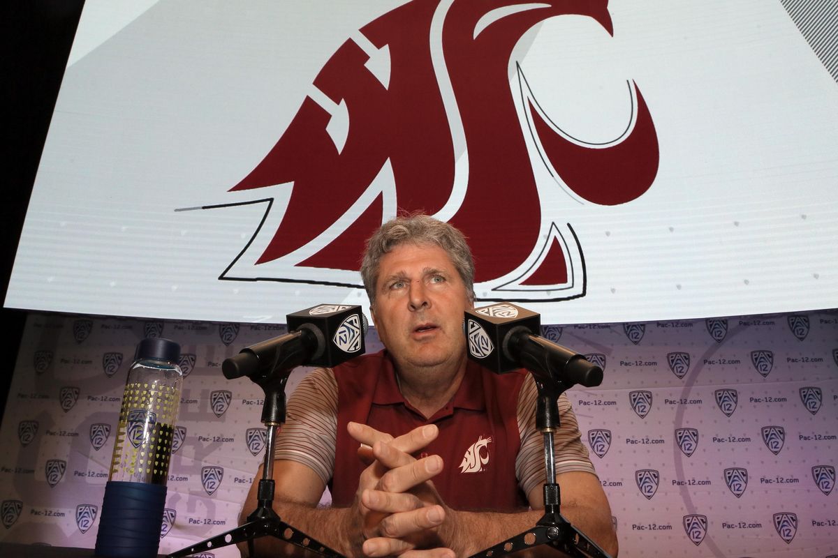 Washington State coach Mike Leach speaks at the Pac-12 NCAA college football media day in Los Angeles on July 14. On Tuesday, Leach accused the media and the local police of unfairly targeting WSU football players. (Reed Saxon / Associated Press)