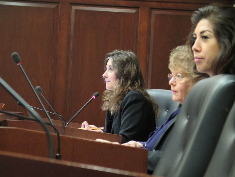 From left, Idaho Reps. Heather Scott, R-Blanchard; Elaine Smith, D-Pocatello; and Paulette Jordan, D-Plummer, consider a proposed financial disclosure bill in the House State Affairs Committee on Wednesday, Jan. 17, 2018. (Betsy Z. Russell)