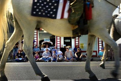 
The Settler Days parade stretches through downtown Deer Park on Saturday as thousands line the streets to watch. 
 (Photos by Jed Conklin / The Spokesman-Review)
