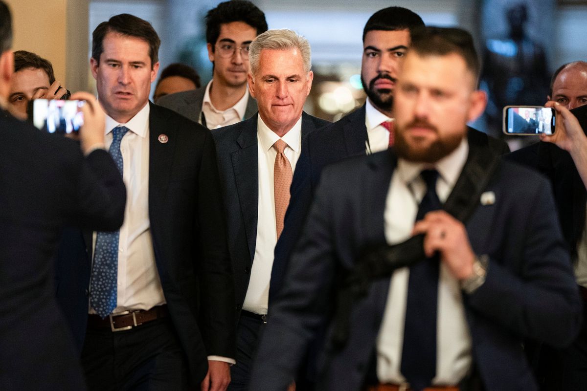House Speaker Kevin McCarthy (R-Calif.) walks into a vote flanked by reporters on Capitol Hill in Washington, D.C., on Wednesday.  (HAIYUN JIANG)