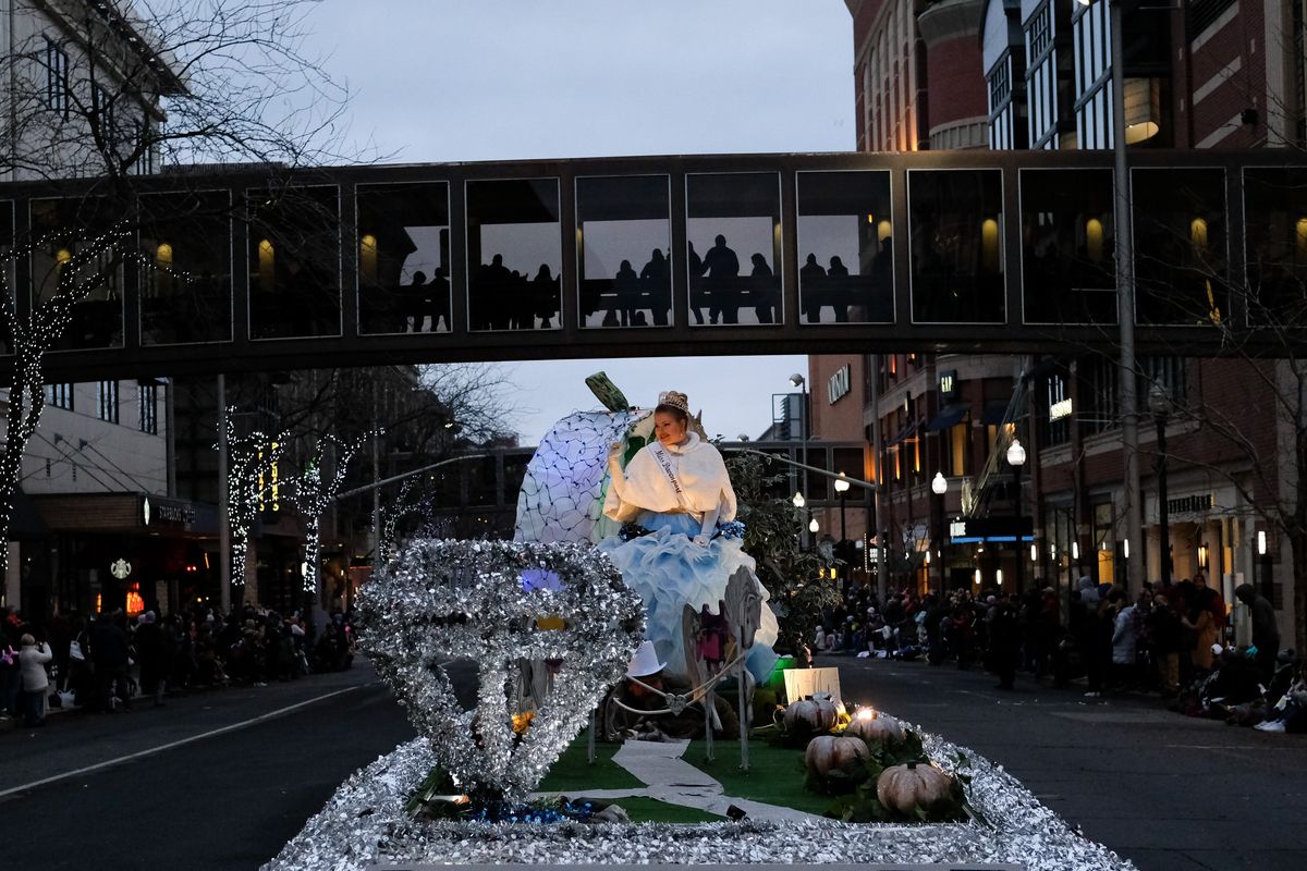 Miss Davenport Adria Marlo passes through downtown during the Spokane Lilac Festival Holiday Parade on Saturday.  (Tyler Tjomsland/The Spokesman-Review)