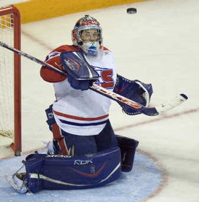 Spokane Chiefs goalie Dustin Tokarski deflects the puck during second-period Memorial Cup play on Tuesday. Associated Press
 (Associated Press / The Spokesman-Review)