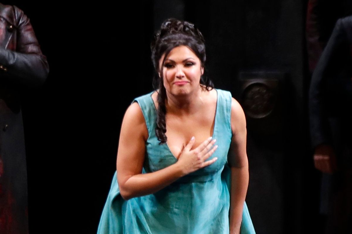 FILE - Russian soprano Anna Netrebko bows to the audience at the end of La Scala opera house