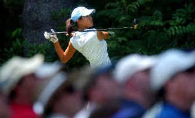 
Michelle Wie and the gallery watch her tee shot on the third hole during the second round. 
 (Associated Press / The Spokesman-Review)