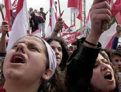 
About 100,000 Lebanese protesters chant anti-Syria slogans during a demonstration in Beirut, Lebanon, on Monday against Syrian military presence. 
 (Associated Press / The Spokesman-Review)