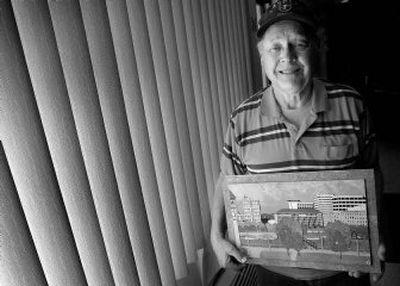 
Keith McDaniel displays  his artwork, 