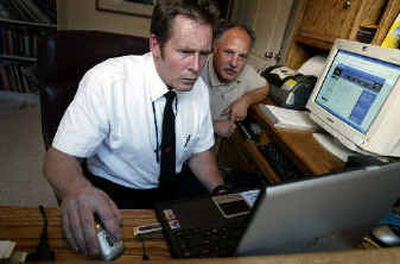Electronics technician and repairman Mark Reardon, left, a member of retailer Best Buy's 