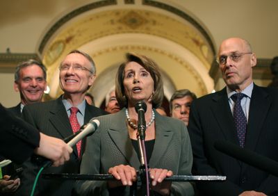 House Speaker Nancy Pelosi, flanked by Senate Majority Leader Harry Reid, left, and Treasury Secretary Henry Paulson, announces the deal.  (Associated Press / The Spokesman-Review)