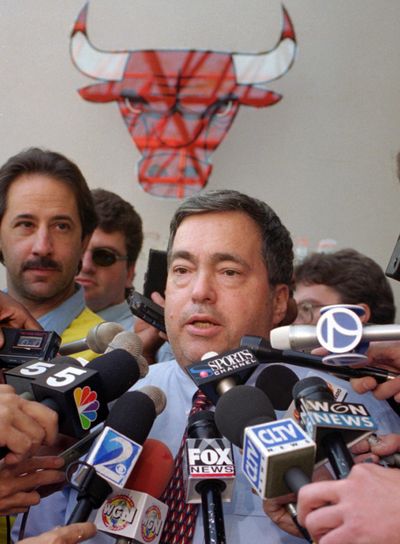 In this Oct. 2, 1995, file photo, Chicago Bulls general manager Jerry Krause speaks to the media in Deerfield, Ill., about trading center Will Perdue for the flamboyant San Antonio Spurs’ Dennis Rodman. Krause, the executive behind the Bulls’ six NBA titles, has died, the team announced Tuesday, March 21, 2017. He was 77. (Michael S. Green / Associated Press)