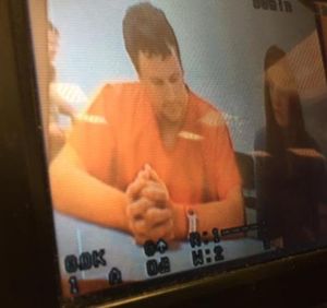 Ryan Turner listens to proceedings during his first appearance in court today. Turner is facing three vehicular homicide charges in the wrong-way-driver crash that killed Mathew-Michael Baroni and his two daughters near Athol this month. A 1st District court judge set bail at $100,000 today.