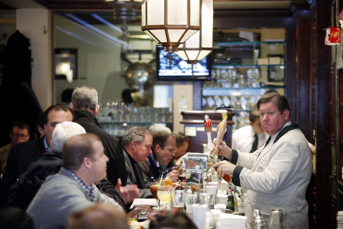 Diners eat lunch at Wollensky’s Grill, inside the famed New York steakhouse Smith & Wollensky. Associated Press photos (Associated Press photos / Associated Press)