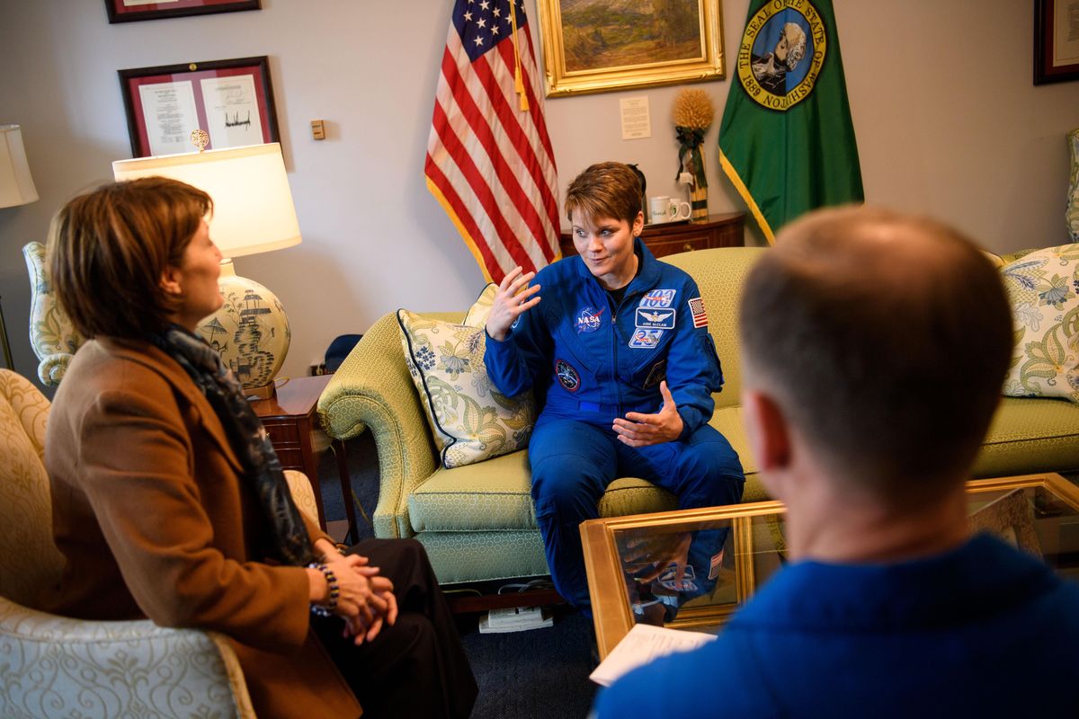 Astronaut Anne McClain center, chats with Rep. Cathy McMorris Rodgers (R-Wash.), left, along with fellow astronaut Nick Hague during a meeting in McMorris Rodgers
