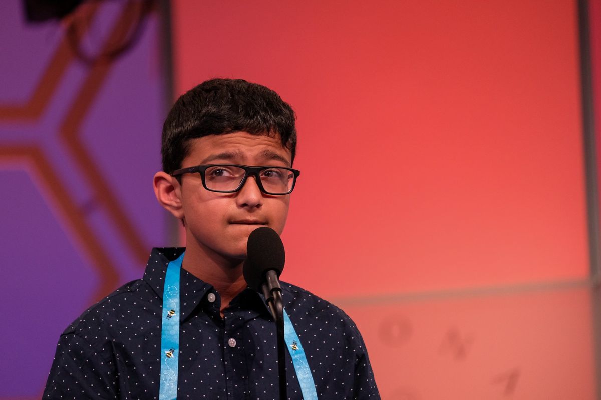 Saharsh Vuppala of Bellevue pauses before spelling a word at the Scripps National Spelling Bee finals on Thursday at National Harbor, Md. The 13-year-old finished fourth, the best performance by a Washingtonian since 1990.  (Orion Donovan-Smith, The Spokesman-Review)