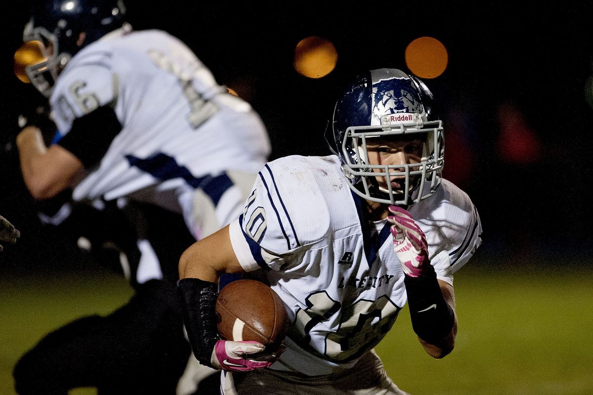 Lake City’s Jerry Louie-McGee takes off on a kickoff return for a TD. He scored twice on kickoff returns and again on a punt return. (Kathy Plonka)