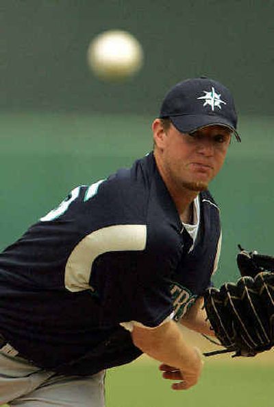 
Seattle's Ryan Franklin works against San Francisco in the first inning Friday. 
 (Associated Press / The Spokesman-Review)