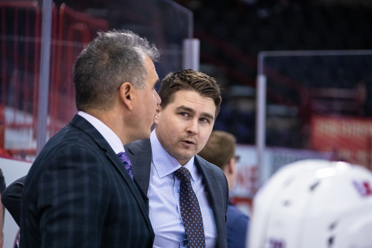 Adam Maglio, facing, chats with former Spokane Chiefs coach Manny Viveiros during a game last January at the Arena. Maglio took over as head coach this season. (Courtesy of Larry Brunt/Spokane Chiefs)
