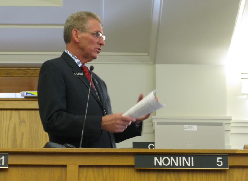 Rep. Bob Nonini, R-Coeur d'Alene, urges the House to support HB 262 to trim teacher pay by freezing movement on the salary schedule and to phase out an early retirement incentive, to save the state $8.1 million next year. (Betsy Russell / The Spokesman-Review)