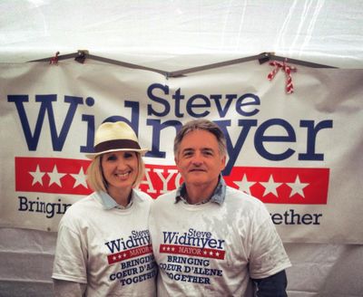 Steve and Marie Widmyer are shown at the Coeur d’Alene Street Fair in summer 2013 when Steve ran successfully for Coeur d’Alene mayor. They are celebrating today. See why in Huckleberries. (Mayor Steve Widmyer/Facebook photo)