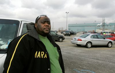 Roswell, a United Auto Worker assemblyman, is seen outside the  truck plant  in Dearborn, Mich., Friday.  The White House appears poised to step in and rescue the beleaguered auto industry.  (Associated Press / The Spokesman-Review)