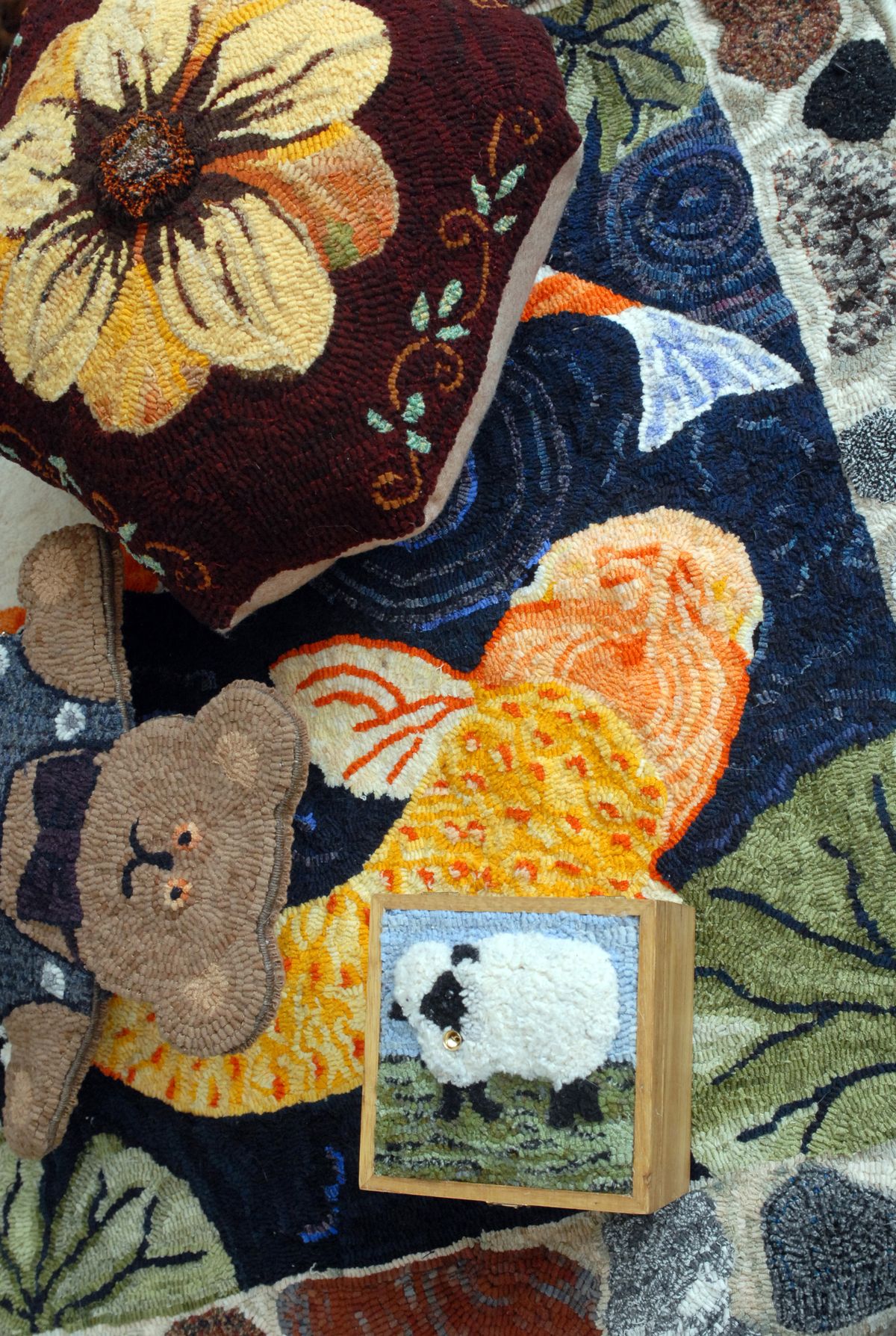Some of the items produced by the rug hookers. (Jesse Tinsley / The Spokesman-Review)