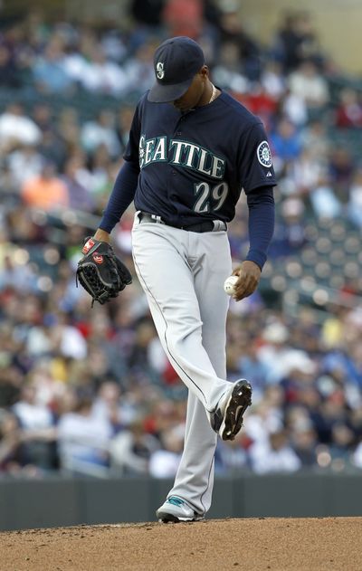 Seattle Mariners starting pitcher Roenis Elias kicks at the mound after giving up a one-run single during the first inning. (AP)