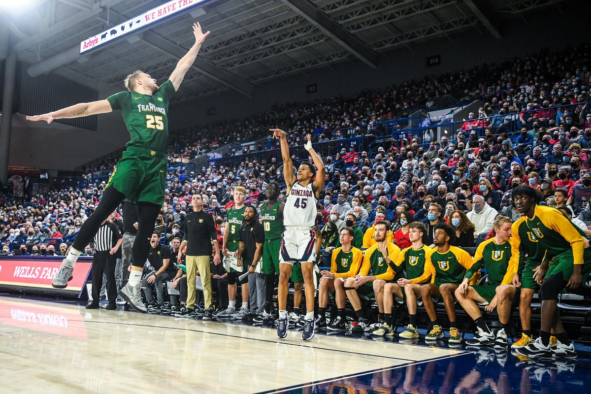 Gonzaga guard Rasir Bolton puts up a 3-pointer over San Francisco forward Yauhen Massalski in the Zags’ victory last Thursday at the McCarthey Athletic Center.  (Dan Pelle/The Spokesman-Review)