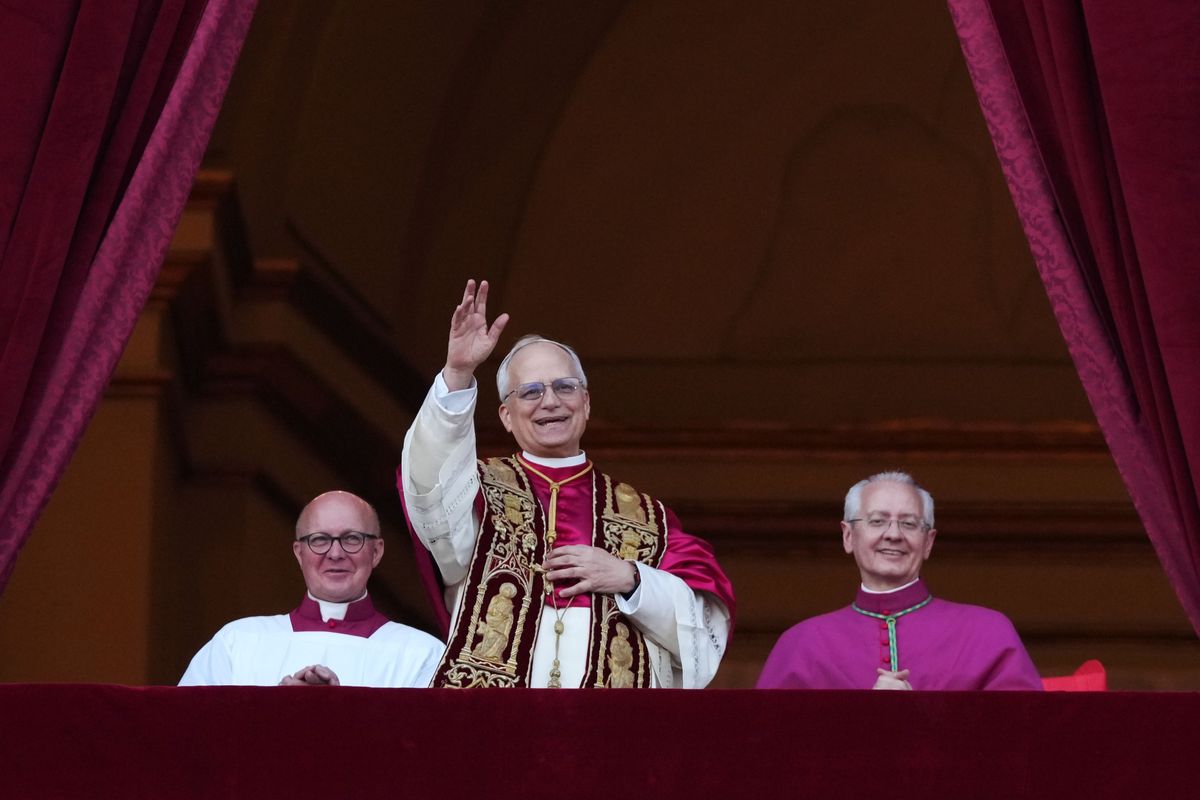 The newly elected pontiff, Pope Leo XIV, is seen for the first time from the Vatican balcony Thursday in Vatican City. White smoke was seen over the Vatican early Thursday evening as the Conclave of Cardinals took just two days to elect Cardinal Robert Francis Prevost, who will be known as Pope Leo XIV, as the 267th Supreme Pontiff after the death of Pope Francis last month. (Christopher Furlong/Getty Image)
