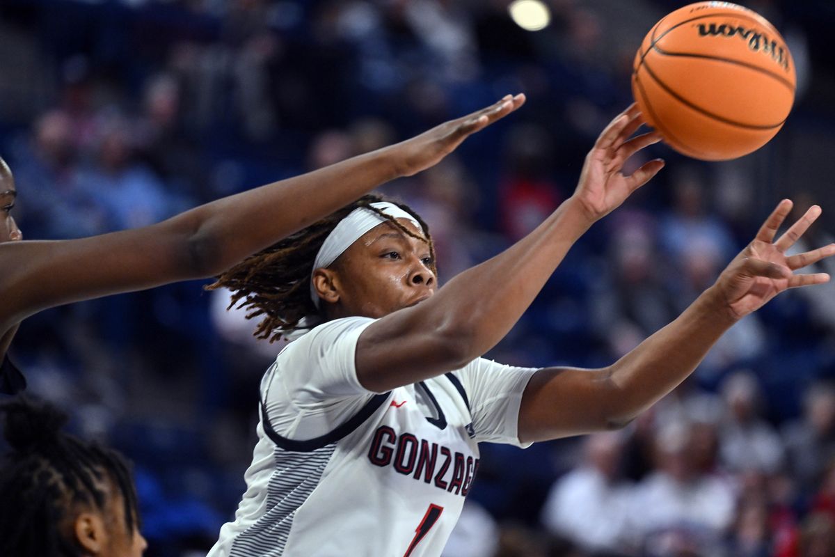 Gonzaga forward Destiny Burton (1) passes the ball during the second half of a college basketball game with Queens University of Charlotte, Tuesday, Dec. 6, 2022 in the McCarthey Athletic Center.  (COLIN MULVANY/THE SPOKESMAN-REVIEW)