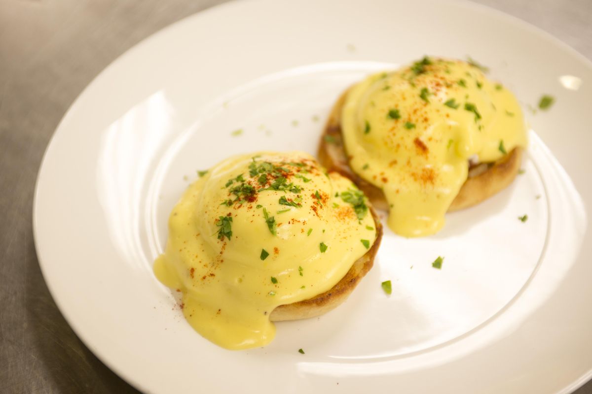 Chef Adam Swedberg made a classic Hollandaise sauce over eggs Benedict to demonstrate the common uses for the sauce, one of five mother sauces in French cooking. (Jesse Tinsley / The Spokesman-Review)