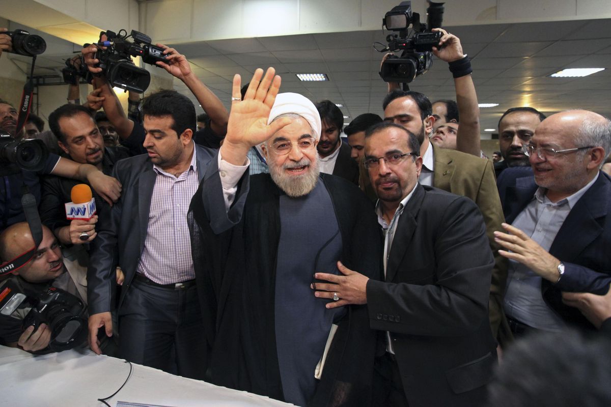 In this photo taken on May 7, 2013, Hassan Rouhani waves, as he arrives at the interior ministry to register his candidacy for presidential election, in Tehran, Iran. Irans hard-liners are hoping they can benefit from the election of U.S. President Donald Trump, arguing that their own country needs a tougher leader to stand up to an American president whose administration has put the Islamic Republic on notice. (Vahid Salemi / File/Associated Press)