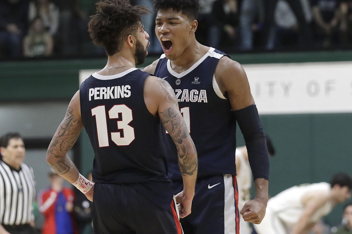 Gonzaga guard Josh Perkins (13) celebrates with forward Rui Hachimura during the second half of the team