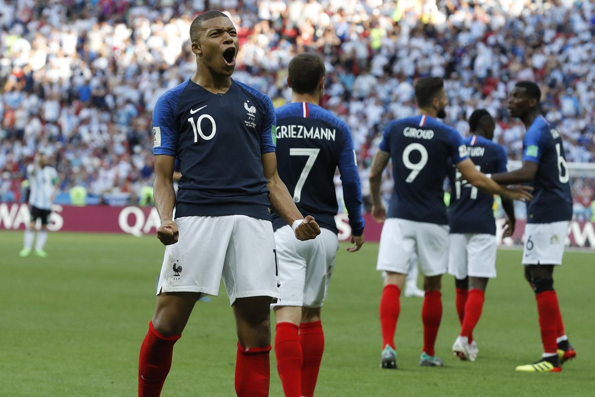 France’s Kylian Mbappe celebrates after scoring his side’s third goal during the World Cup round of 16 match against Argentina last Saturday  in Kazan, Russia. (David Vincent / AP)