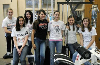 
Trainers and managers for LC football are Danielle Price, Jessica Matresse, Elizabeth Webster, Amber Mackin, Katie Matresse, Jessica Scott and Ellen Webster. Not pictured: Laurel Abbott.
 (Dan Pelle / The Spokesman-Review)