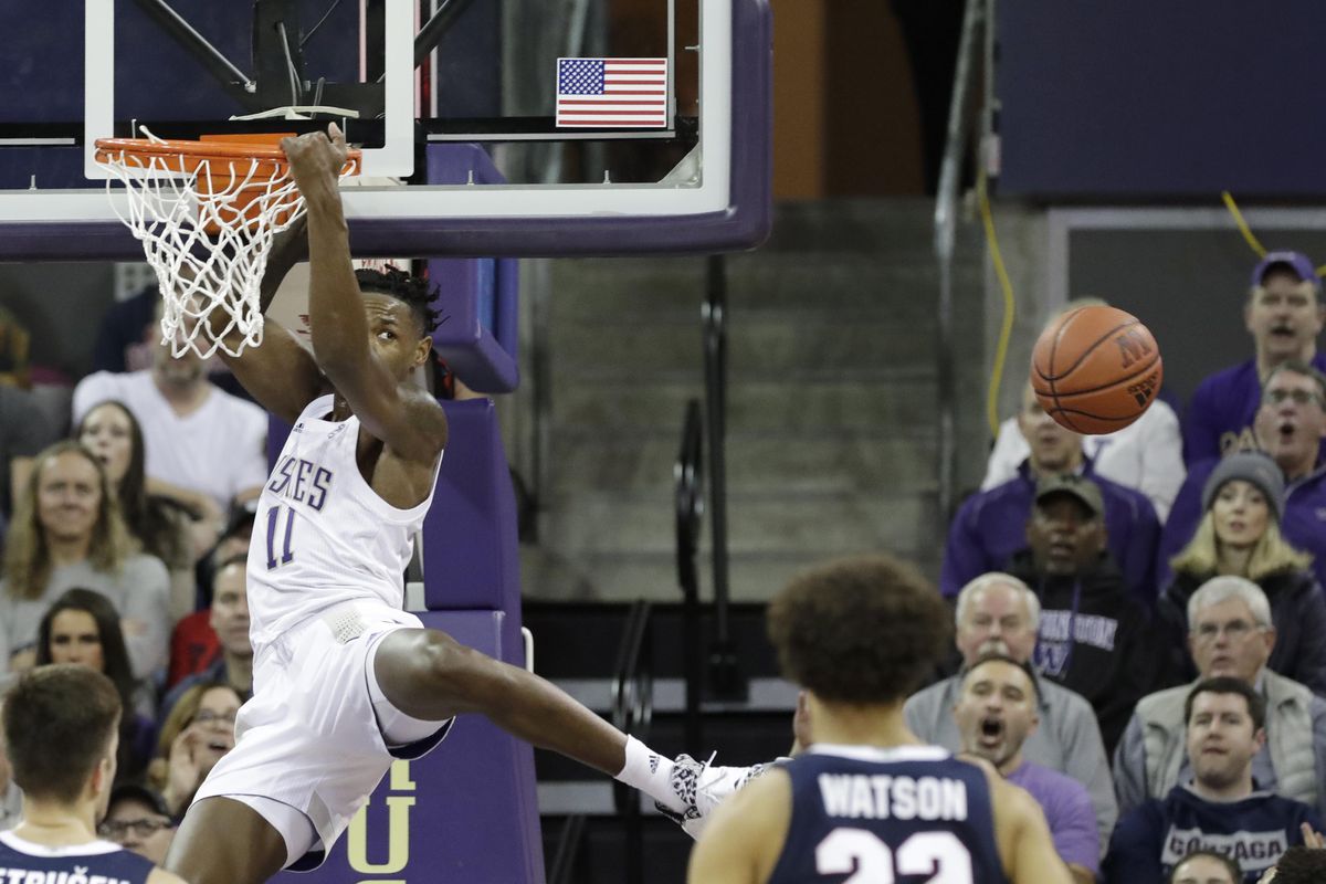 Washington's Nahziah Carter eyes the ball as it goes past after he leapt hoping to snag the pass and dunk against Gonzaga in the first half of an NCAA college basketball game Sunday, Dec. 8, 2019, in Seattle. Gonzaga won 83-76. (Elaine Thompson / AP)
