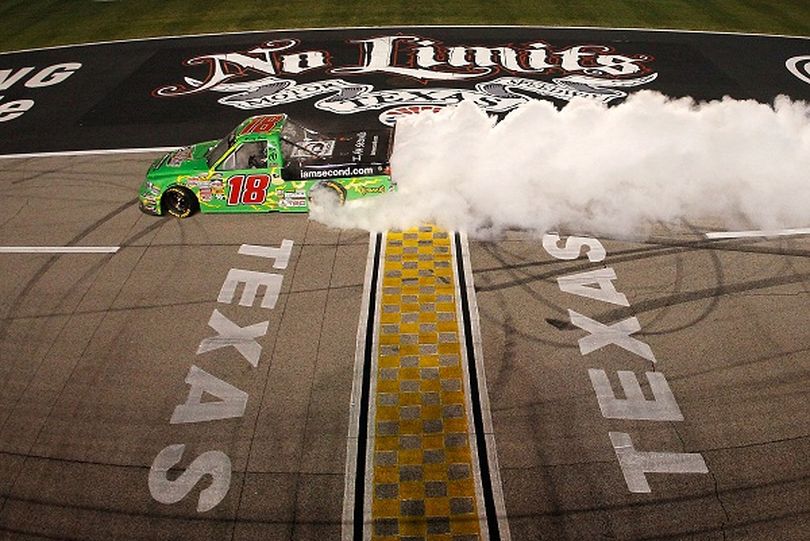 Defending race winner Kyle Busch captured his second win and sixth top-10 finish in eight races at Texas Motor Speedway on Friday night. (Photo Credit: Todd Warshaw/Getty Images) (Todd Warshaw / Getty Images North America)