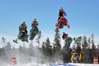 Stunt riders perform at the annual Snowmobile Expo in West Yellowstone, Mont. Courtesy of World Snowmobile (Courtesy of World Snowmobile / The Spokesman-Review)