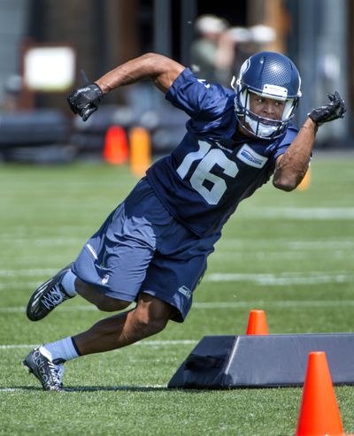 Return man Tyler Lockett works out on Friday. (Associated Press)