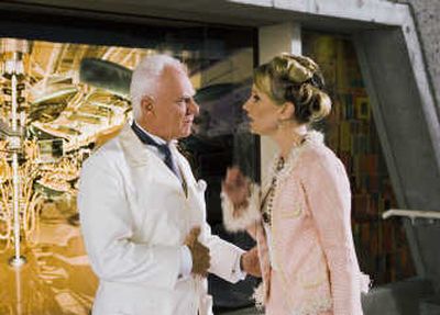 
Actors Malcolm McDowell and Anne Heche appear in a scene from an episode in the four-part 