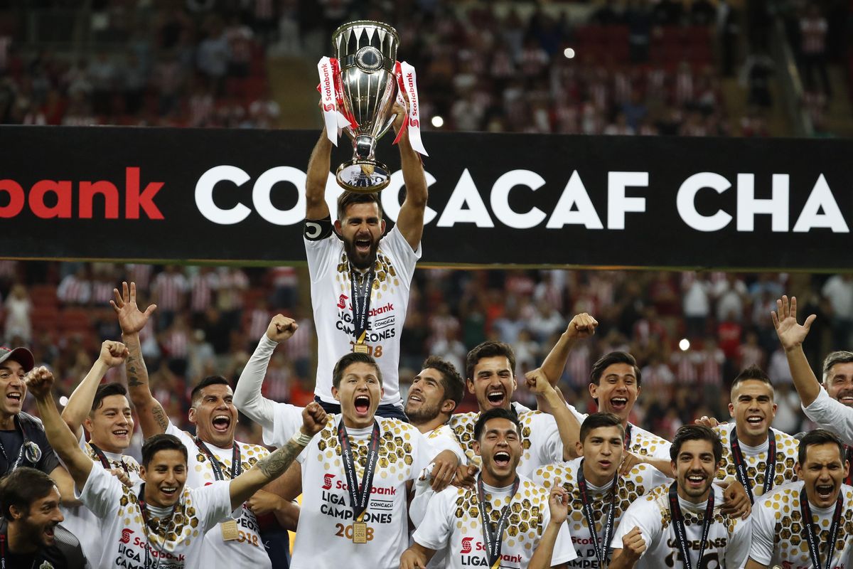 Chivas players hold the trophy aloft as they celebrate winning the CONCACAF Champions League final soccer match in Guadalajara, Mexico, Wednesday, April, 25, 2018. Chivas defeated Toronto FC in a penalty shoot out. (Edurado Verdugo / Associated Press)