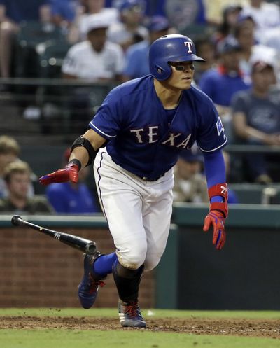In this Aug. 2, 2017 photo, Texas Rangers’ Shin-Soo Choo sprints to first after hitting a single to right off of Seattle Mariners starting pitcher Ariel Miranda during the fourth inning of a baseball game in Arlington, Texas. (Tony Gutierrez / Associated Press)